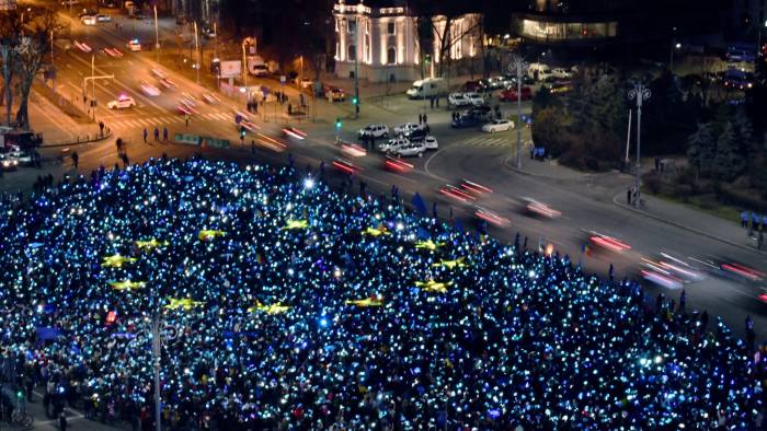 TOPSHOT - A EU flag made out of lights by around 6000 people in front of the Romanian government headquarters in Bucharest, Romania is pictured on February 26, 2017. Protesters gather for the 27th day in a row asking for the Grindeanu cabinet to resign. / AFP / Daniel MIHAILESCU (Photo credit should read DANIEL MIHAILESCU/AFP/Getty Images)