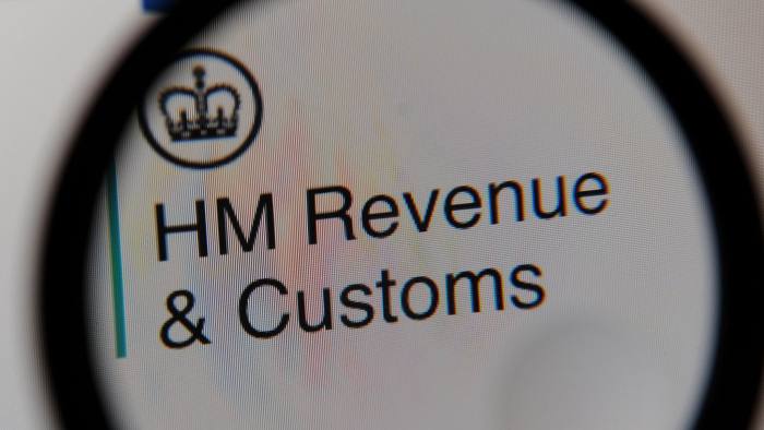 M11M4K HM Revenue & Customs website seen through a magnifying glass