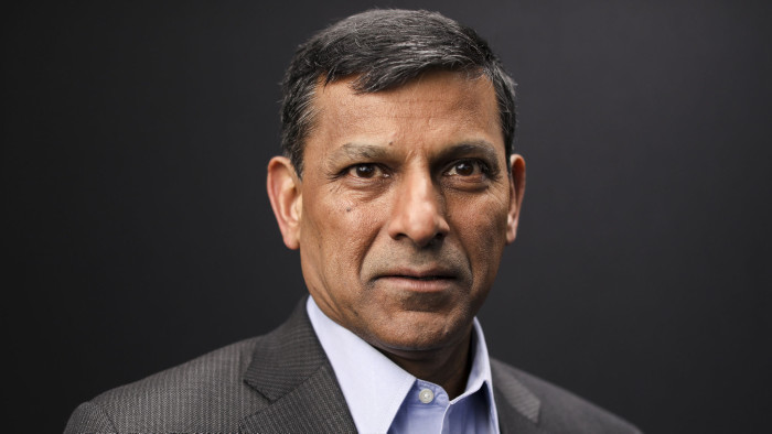 Raghuram Rajan, former governor of the Reserve Bank of India (RBI), poses for a photograph following a Bloomberg Television interview on the opening day of the World Economic Forum (WEF) in Davos, Switzerland, on Tuesday, Jan. 22, 2019. World leaders, influential executives, bankers and policy makers attend the 49th annual meeting of the World Economic Forum in Davos from Jan. 22 - 25. Photographer: Simon Dawson/Bloomberg