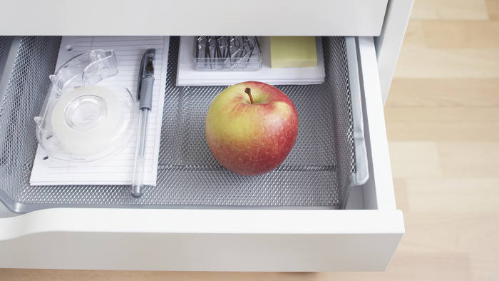 apple inside a desk drawer