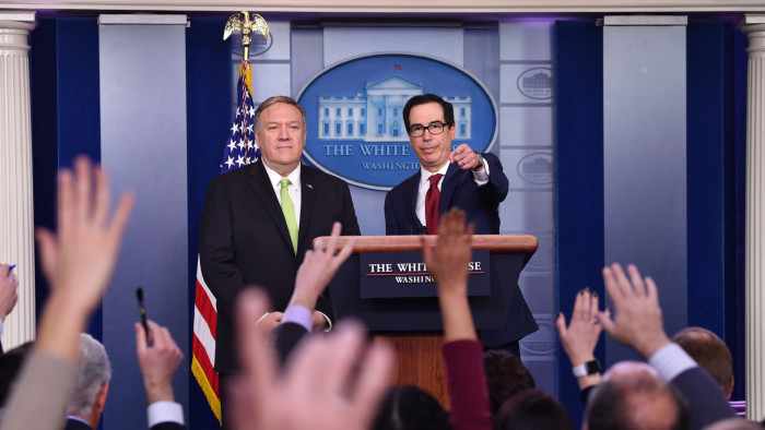 US Secretary of State Mike Pompeo and Treasury Secretary Steven Mnuchin take questions after announcing new sanctions on Iran, at the White House in Washington, DC, on January 10, 2020. (Photo by Nicholas Kamm / AFP) (Photo by NICHOLAS KAMM/AFP via Getty Images)