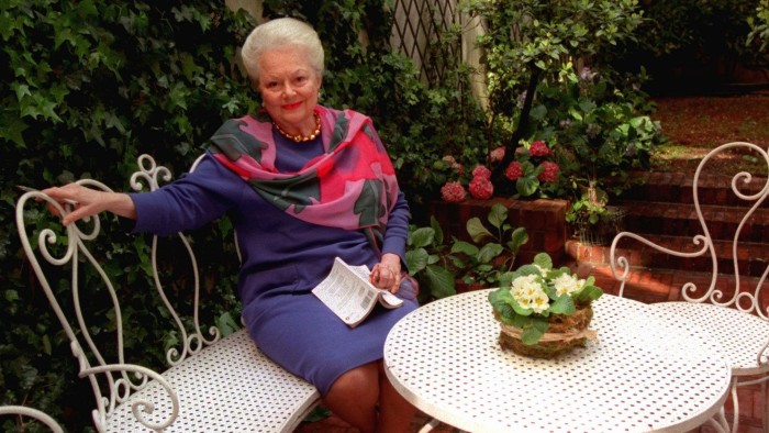 ADVANCE FOR WEEKEND EDITIONS, MAY 23-25 -- Olivia de Havilland, the Oscar-winning actress who played the charitable and loving Melanie in &quot;Gone With The Wind&quot;, sits in the garden ofher Paris home, April 15, 1997. Although de Havilland has not acted since 1988, when she appeared in a television movie &quot;The Woman He Loved,&quot; she insists she is not retired. (AP Photo/Michel Lipchitz)