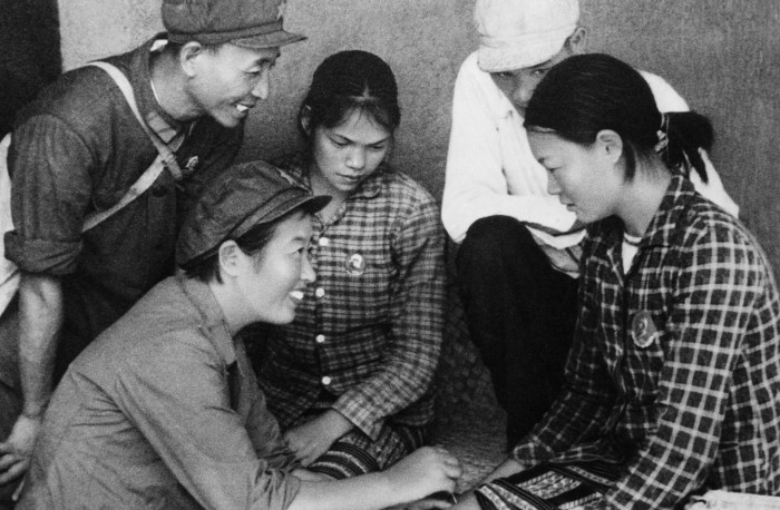 A medical team (Barefoot Doctors) led by communist party member Ma Yi is active in the Wuchih Mountains area, serving the peasants of the Li nationality. Performing acupuncture. China. 1968. Cultural Revolution. (Photo by: Sovfoto/Universal Images Group via Getty Images)