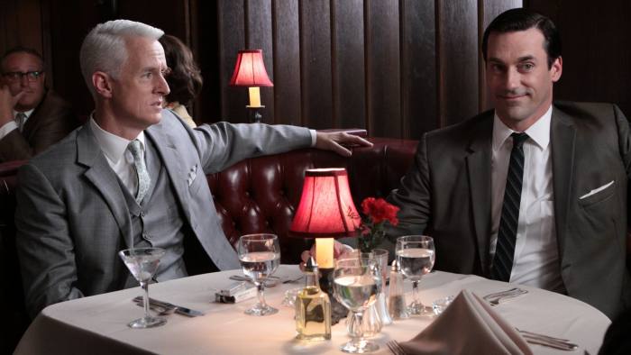 MAD MEN - Series 3 - Episode 2 - Love Among the Ruins - Don is brought in to save the day for a P.R. campaign involving the building of the new Madison Square Garden, only to have the rug pulled out from under him. At home, Betty argues with her brother over how to care for their sick father. - John Slattery as Roger Sterling and Jon Hamm as Don Draper