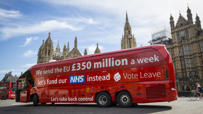 LONDON, ENGLAND - JULY 18: A 'Vote LEAVE' battle bus is parked outside the Houses of Parliament in Westminster by the environmental campaign group Greenpeace before being re-branded on July 18, 2016 in London, England. The bus which was used during the European Union (EU) referendum campaign and had the statement &quot;We send the EU Â£350 million a week let's fund our NHS instead&quot; along the side was today covered with thousands of questions for the new Prime Minister Theresa May and her government about what a 'Brexit' might mean for the environment. (Photo by Jack Taylor/Getty Images)