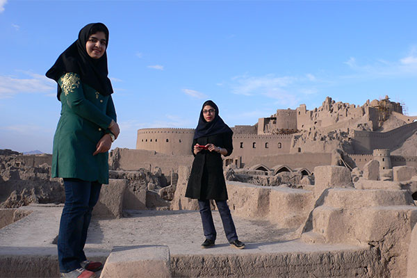 Visitors to the restored adobe citadel at Bam