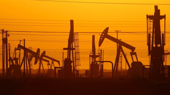 Pump jacks are seen at dawn in an oil field over the Monterey Shale formation in California, US