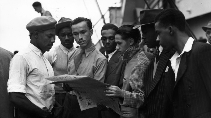 22nd June 1948: Newly arrived Jamaican immigrants on board the 'Empire Windrush' at Tilbury. (Photo by Douglas Miller/Keystone/Getty Images)