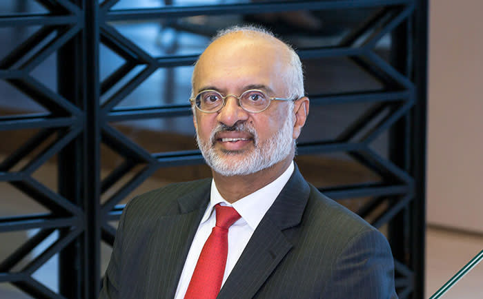Piyush Gupta, chief executive officer of DBS Group Holdings Ltd., poses for a photograph following a Bloomberg Television interview in Singapore, on Monday, Feb. 18, 2019. DBS relied on lending to boost fourth-quarter profit as financial-market turbulence hit its trading, wealth and investment banking operations. Photographer: Ore Huiying/Bloomberg