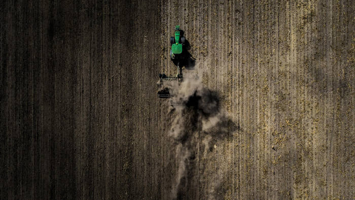 NEUHARDENBERG, GERMANY - SEPTEMBER 06: Aerial view to a tractor during its work on a dry field on September 06, 2018 in Neuhardenberg, Germany. (Photo by Florian Gaertner/Photothek via Getty Images)