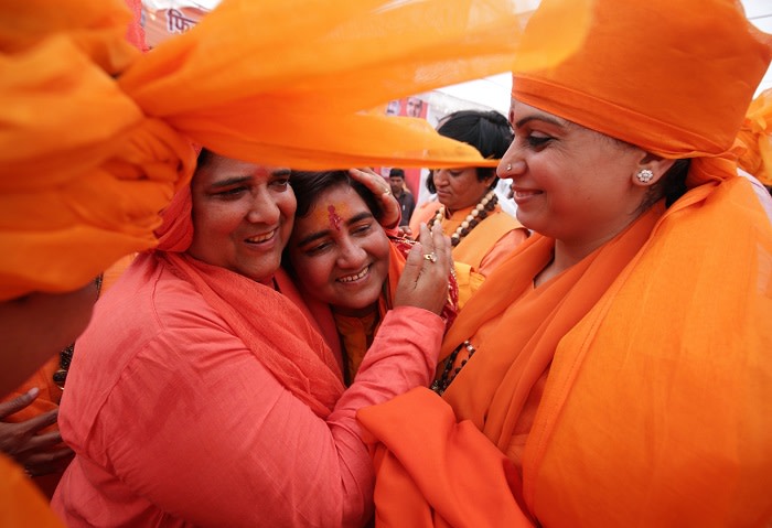 Sadhvi Pragya Singh Thakur (C) is welcomed during a rally before filing her nomination for the Bharatiya Janata Party (BJP) in the parliamentary elections in Bhopal on April 23, 2019. - Some 190 million voters in 15 states are eligible to take part in the polls on the third of seven days of voting in the world's biggest election. (Photo by GAGAN NAYAR / AFP) (Photo credit should read GAGAN NAYAR/AFP/Getty Images)