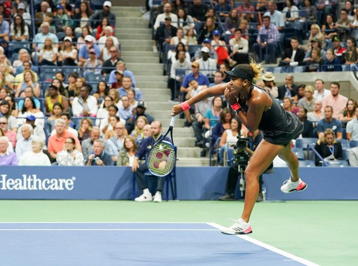 Osaka serving against Serena Williams during the final of the US Open, which she won in straight sets. Asked how it felt playing in the biggest match of her career, she says: ‘I [didn’t] really notice the crowd. It [was] kind of dialled down. When I watch the match back, I hear it more than I did when I was playing.’
