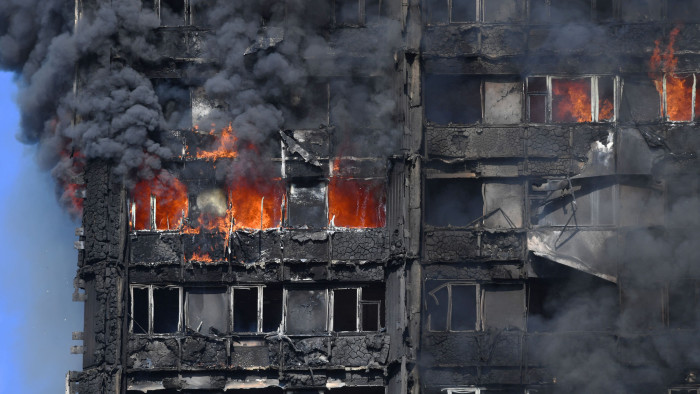 Smoke billows from a fire that has engulfed the 24-storey Grenfell Tower in west London. PRESS ASSOCIATION Photo. Picture date: Wednesday June 14, 2017. More than 200 firefighters were sent to tackle the blaze and London Ambulance Service said 30 people had been taken to five hospitals. See PA story FIRE Grenfell. Photo credit should read: Victoria Jones/PA Wire