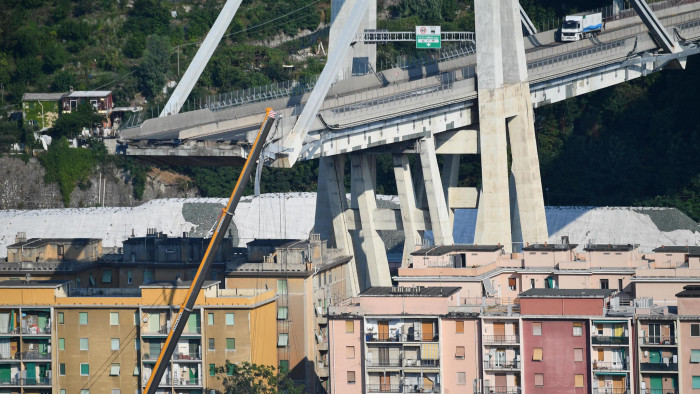 Mandatory Credit: Photo by LUCA ZENNARO/EPA-EFE/REX/Shutterstock (9794190d) A general view showing a part of the partially collapsed Morandi bridge, in Genoa, Italy, 19 August 2018. Italian authorities, worried about the stability of remaining large sections of the bridge, evacuated about 630 people from nearby apartments. The Morandi bridge partially collapsed on 14 August, killing at least 41 people. Genoa Morandi bridge collapse aftermath, Italy - 19 Aug 2018