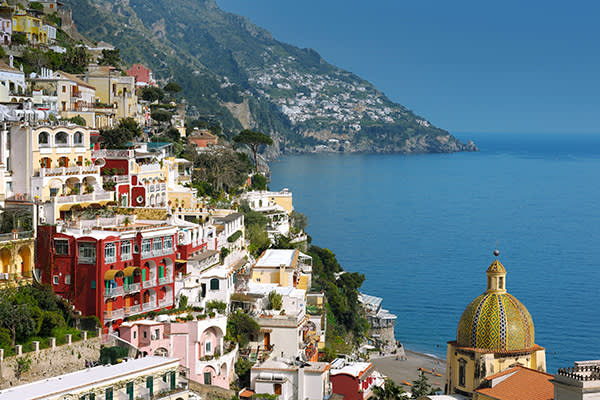 Le Sirenuse hotel (red building to the left of frame), Positano, Italy