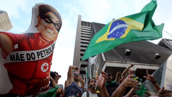 A demonstrators holds an inflatable doll depicting Brazilian President Dilma Rousseff as he takes part in a protest against the appointment of Brazil's former President Luiz Inacio Lula da Silva as her chief of staff, at Paulista avenue in Sao Paulo, Brazil, March 17, 2016. REUTERS/Paulo Whitaker