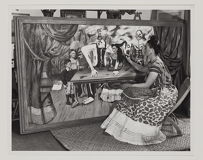 3713201 Frida Kahlo Putting Finishing Touches on One of Her Paintings, c.1940 (gelatin silver print) by Silberstein, Bernard (1905-99); Detroit Institute of Arts, USA; (add.info.: Frida Kahlo (1907-54) Mexican artist At work on ‚ÄòThe Wounded Table‚Äô, a now lost work); Gift of the Artist; PERMISSION REQUIRED FOR NON EDITORIAL USAGE; RESTRICTIONS MAY APPLY FOR COMMERCIAL USE - PLEASE CONTACT US; American, in copyright. PLEASE NOTE: This image is protected by artist\'s copyright which needs to be cleared by you. If you require assistance in clearing permission we will be pleased to help you. In addition, we work with the owner of the image to clear permission. If you wish to reproduce this image, please inform us so we can clear permission for you.