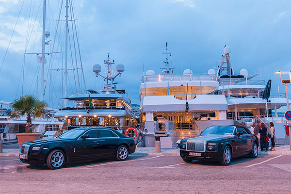 Luxury yachts and cars in Ibiza Town