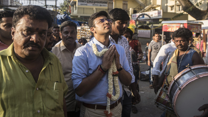 Tejasvi Surya, the 28-year-old candidate for the right wing Hindu Nationalist BJP in the ongoing National Elelections visits a Hindu Temple at a fair in Bangalore South.