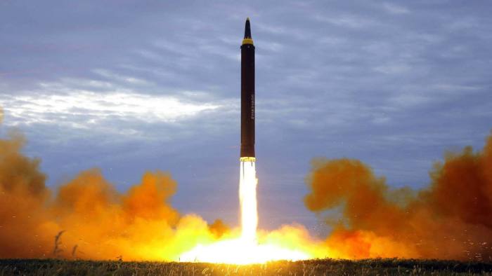 FILE - This Aug. 29, 2017 file photo distributed on Aug. 30, 2017, by the North Korean government shows what was said to be the test launch of a Hwasong-12 intermediate range missile in Pyongyang, North Korea. 
Japan is debating whether to develop limited pre-emptive strike capability and buy cruise missiles - ideas that were anathema in the pacifist country before the North Korea missile threat.  North Korea‚Äôs test-firing of a missile on Aug. 29, 2017, which flew over Japan and landed in the northern Pacific Ocean, quickly reactivated the debate at parliament and in the media. (Korean Central News Agency/Korea News Service via AP, File)
