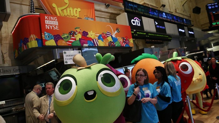 NEW YORK, NY - MARCH 26:  Characters from the game Candy Crush are seen on the floor of the New York Stock Exchange (NYSE), in honor of the mobile gaming company King holding its initial public offering at the NYSE on March 26, 2014 in New York City. King is the maker of the popular mobile game Candy Crush.  (Photo by Andrew Burton/Getty Images)