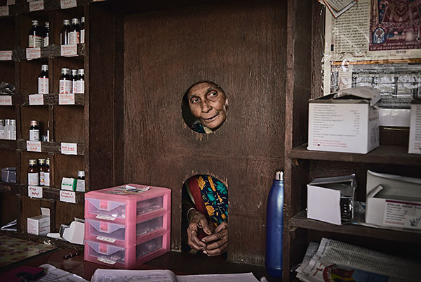 Waiting for medication at a health centre in the state of Gujarat