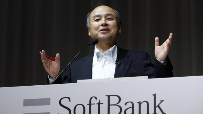 Billionaire Masayoshi Son, chairman and chief executive officer of SoftBank Group Corp., gestures as he speaks during a news conference in Tokyo, Japan, on Tuesday, May 10, 2016. SoftBank quarterly profit dived 30 percent as the Japanese company struggled to turn around unprofitable U.S. carrier Sprint Corp. Photographer: Tomohiro Ohsumi/Bloomberg