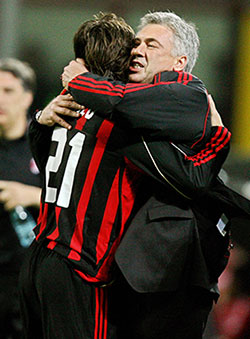 Pirlo (left) is congratulated by his coach Carlo Ancelotti during their 2007 Champions League quarter-final 