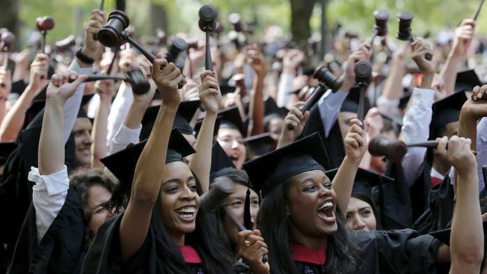 Students graduating from the School of Law cheer as they receive their degrees during the 364th Commencement Exercises at Harvard University in Cambridge, Massachusetts May 28, 2015.    REUTERS/Brian Snyder - RTX1EZC9