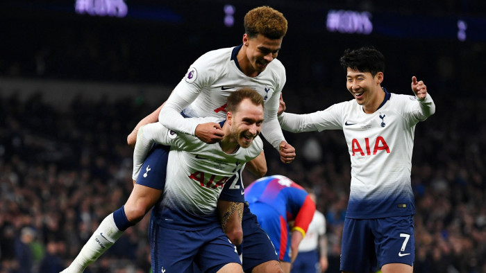 Soccer Football - Premier League - Tottenham Hotspur v Crystal Palace - Tottenham Hotspur Stadium, London, Britain - April 3, 2019  Tottenham's Christian Eriksen celebrates scoring their second goal with Dele Alli and Son Heung-min                     REUTERS/Dylan Martinez  EDITORIAL USE ONLY. No use with unauthorized audio, video, data, fixture lists, club/league logos or &quot;live&quot; services. Online in-match use limited to 75 images, no video emulation. No use in betting, games or single club/league/player publications.  Please contact your account representative for further details.     TPX IMAGES OF THE DAY