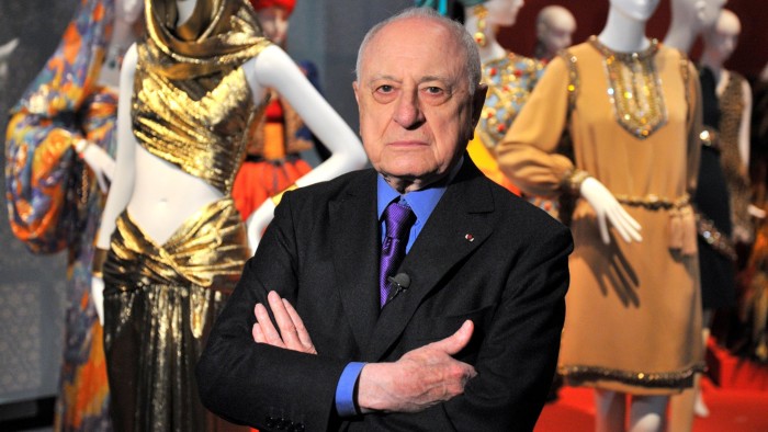 Pierre Berges among creations of Yves Saint-Laurent at an exhibition dedicated to the designer at the Petit Palais in Paris in 2010