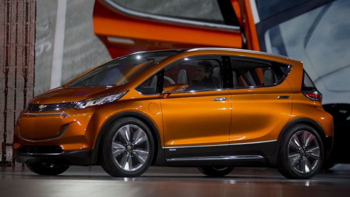 Inside The 2015 North American International Auto Show (NAIAS)...The General Motors Co. (GM) Chevrolet Bolt concept vehicle is unveiled during the 2015 North American International Auto Show (NAIAS) in Detroit, Michigan, U.S., on Monday, Jan. 12, 2015. General Motors is unveiling a new version of its plug-in hybrid Chevrolet Volt as gas hovers near $2 a gallon and the number of buyers who want a fuel-sipping vehicle shrinks. Photographer: Andrew Harrer/Bloomberg
