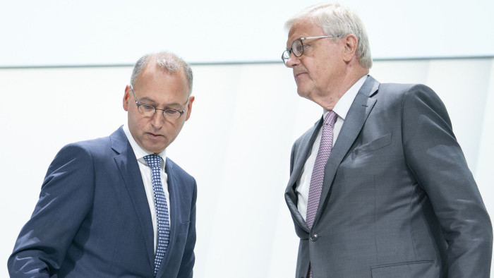 Werner Baumann, chief executive officer of Bayer AG, left, stands with Werner Wenning, chairman of Bayer AG, prior to the company's annual general meeting in Bonn, Germany, on Friday, April 26, 2019. Baumann faces the biggest test of his three-year tenure as shareholders increasingly upset with the Monsanto takeover gather for a day-long meeting that will culminate in a crucial confidence vote. Photographer: Jasper Juinen/Bloomberg