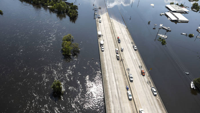 Interstate 10 is submerged by floodwaters of Tropical Storm Harvey on Friday, Sept. 1, 2017, in Vidor, Texas. (Brett Coomer/Houston Chronicle via AP)
