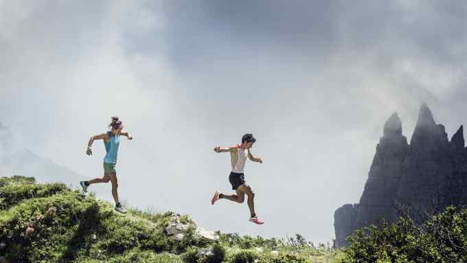 Kilian Jornet running with his girlfriend in the Italian Dolomites in 2013 credit Markus Berger