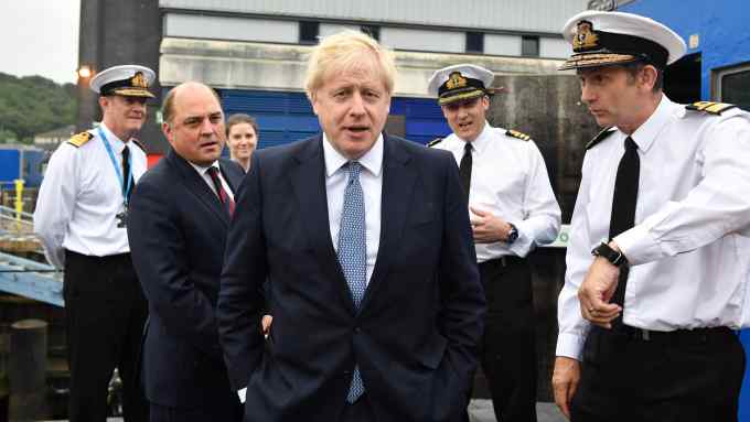 FASLANE, SCOTLAND - JULY 29: Britain's Prime Minister Boris Johnson visits HMS Vengeance with Defence Secretary Ben Wallace at HM Naval Base Clyde on July 29, 2019 in Faslane, Scotland. The PM is due to announce £300m of funding to help communities in Scotland, Wales and Northern Ireland. (Photo by Jeff J Mitchell - WPA Pool/Getty Images)