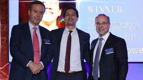 The winner in 2018, Andrew Leon Hanna, centre, with FT editor Lionel Barber, left, and McKinsey's Kevin Sneader