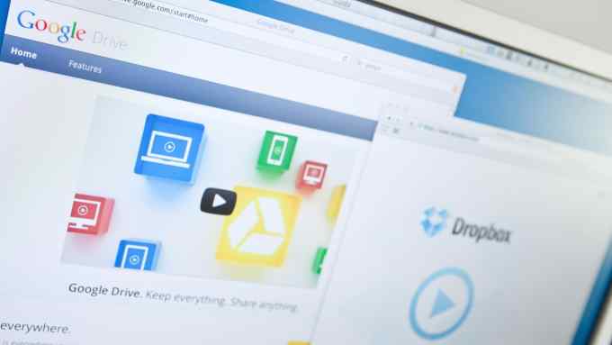 "Belluno, Italy - May 3, 2012: Google has opened its online drive ""Google Drive"". Home users and businesses to store up to five gigabytes of data for free, for a larger capacity is paid a monthly fee. Dropbox is a Web-based file hosting service operated by Dropbox."