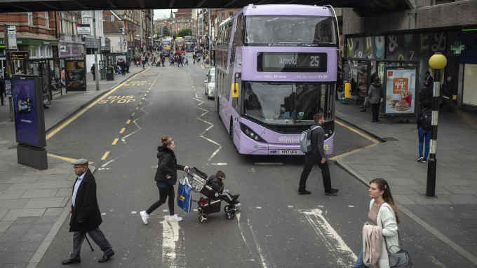 11/10/2019 Nottingham clean air story with Andy Bounds. Picture shows : Trams and buses in central Nottingham.