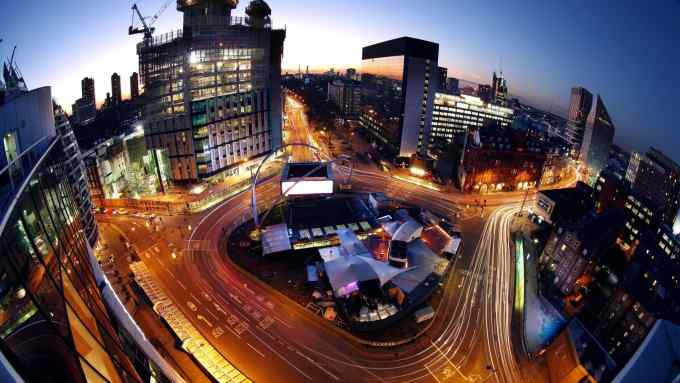 Light trails made by traffic passing around the Old Street roundabout, also referred to as 'Silicon Roundabout,' in the area known as 'Tech City' at dusk in London, U.K., on Friday, Jan. 15, 2016. Growing peer-to-peer lending and online money transfer services helped raise a record $3.6 billion in venture capital funding for the U.K.'s technology sector last year, according to data compiled by London & Partners. Photographer: Chris Ratcliffe/Bloomberg