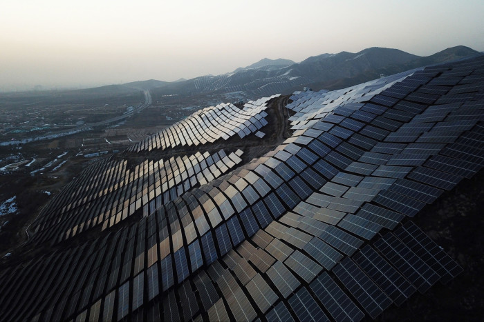 Solar panels follow the contours of a hillside in China