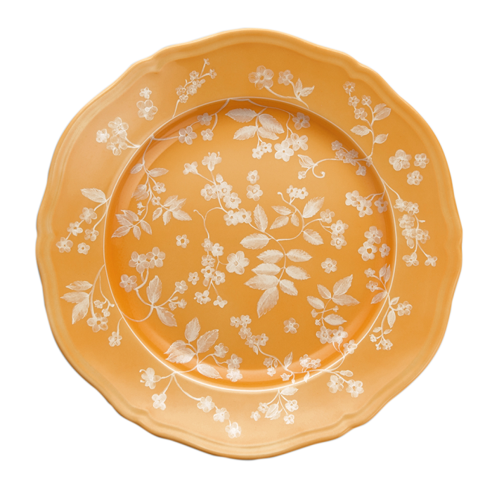A flower-shaped plate with tiny flower prints on it