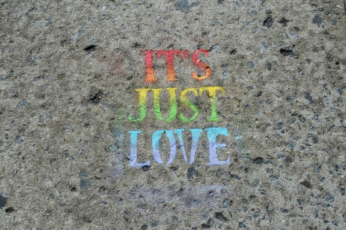 Stencil grafitti on sidewalk