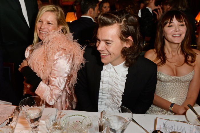 Harry Styles wearing a ruffled shirt at Annabel’s in 2014, with Kate Moss