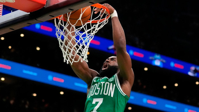 Jaylen Brown of the Boston Celtics  dunks the ball during Game 5 of the NBA basketball finals against the Dallas Mavericks