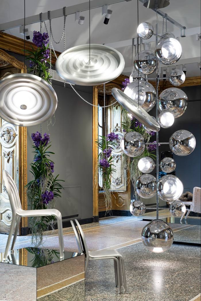 Tom Dixon’s Press Metal lights and vertical Mirror Ball chandelier