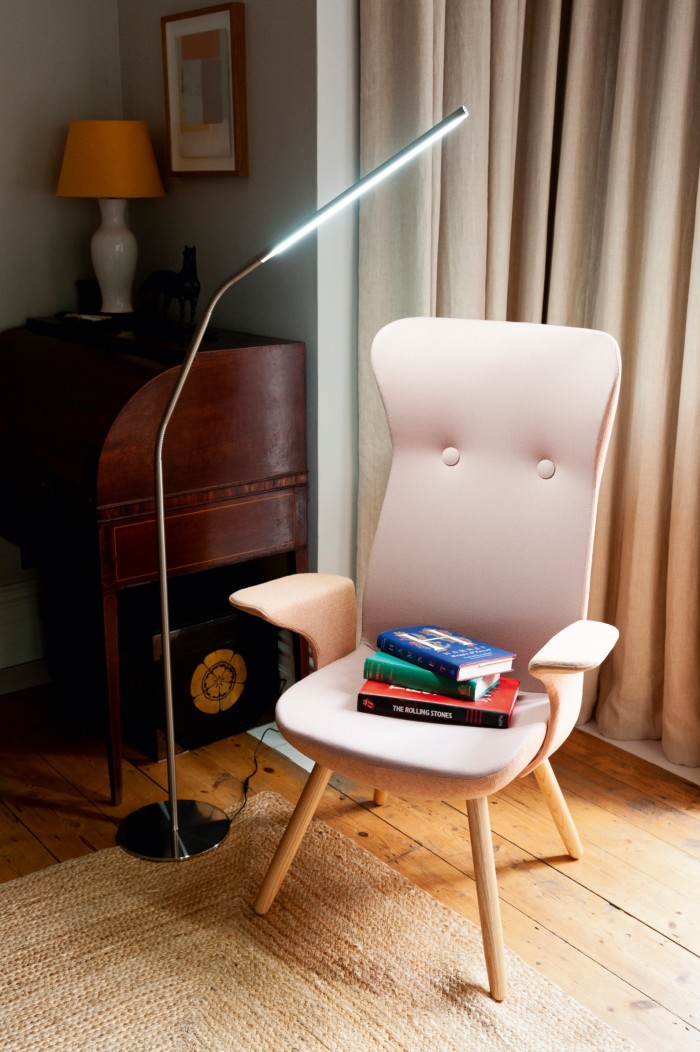 The Edith Armchair, £1,175, and slimline LED reading light, £190