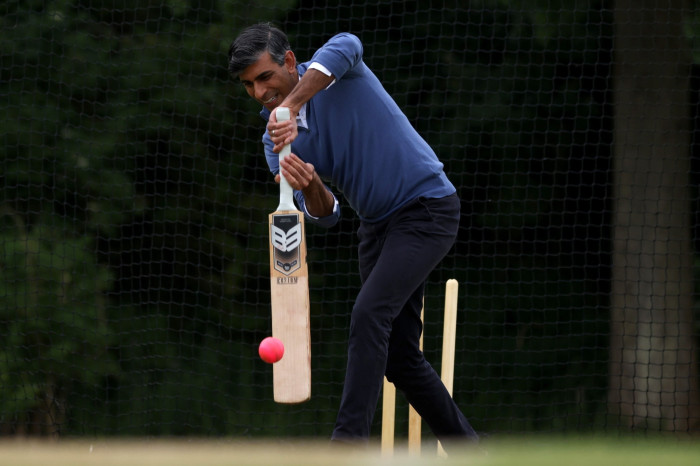Prime Minister Rishi Sunak bats in the nets during his visit to Nuneaton Cricket Club