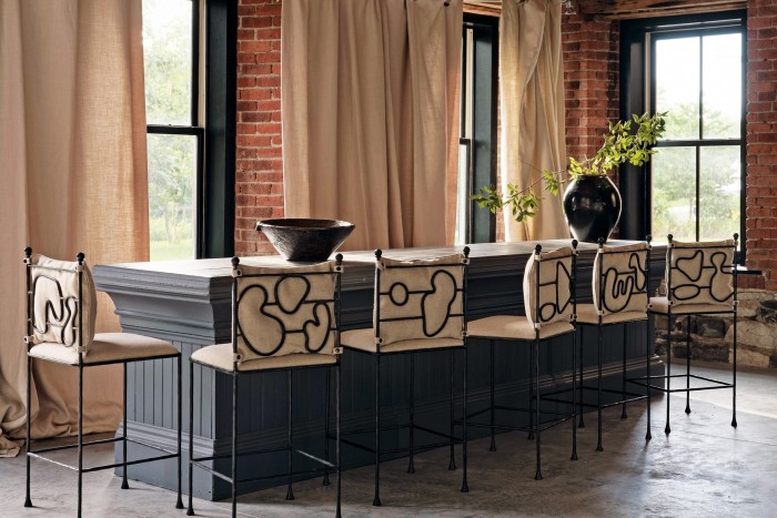 Counter stools go back to the bronze age. Anna Karlin’s wrought-iron seating forgoes the froufrou of filigree with a sculptural, glyph-like silhouette that’s elegantly elemental, £4,300 each, from Anna Karlin Furniture + Fine Objects. annakarlin.com