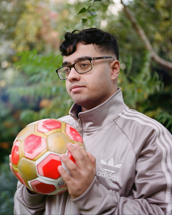 Bilaal Ali holding a football